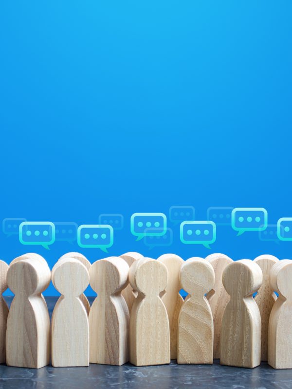 People figures with comment clouds above their heads. Social communication. Information exchange. Rumors and gossip. Talk and chat. Discussion and dialogue. Public opinion poll. Dispute settling